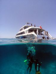 Another days diving. Afloat the Great Barrier Reef by Joshua Miles 